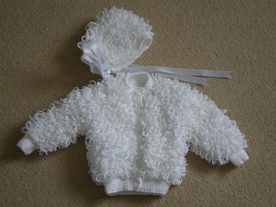 LOVELY BRILLAINT WHITE LOOPY CARDIGAN AND MATCHING HAT AGE 0-3 MONTHS